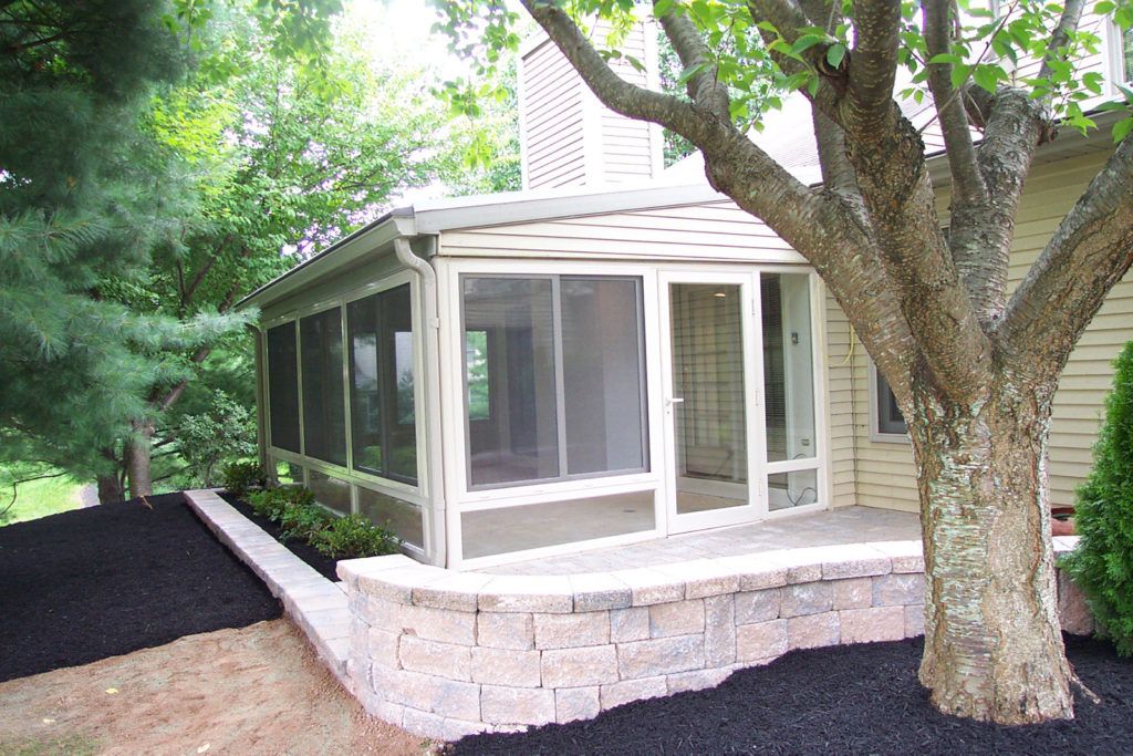 Elite 2000 sunroom glass enclosure on a residential home