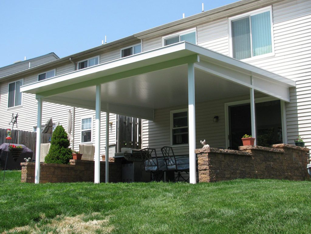 Flat pan single skin patio cover roof system on a residential home