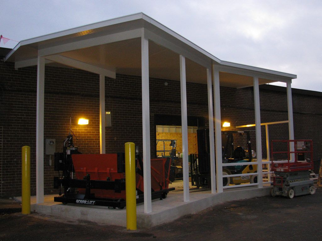 Flat pan single skin patio cover roof system on a commercial dock