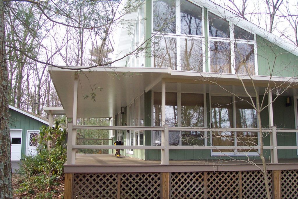 Flat pan single skin patio cover roof system on a residential home