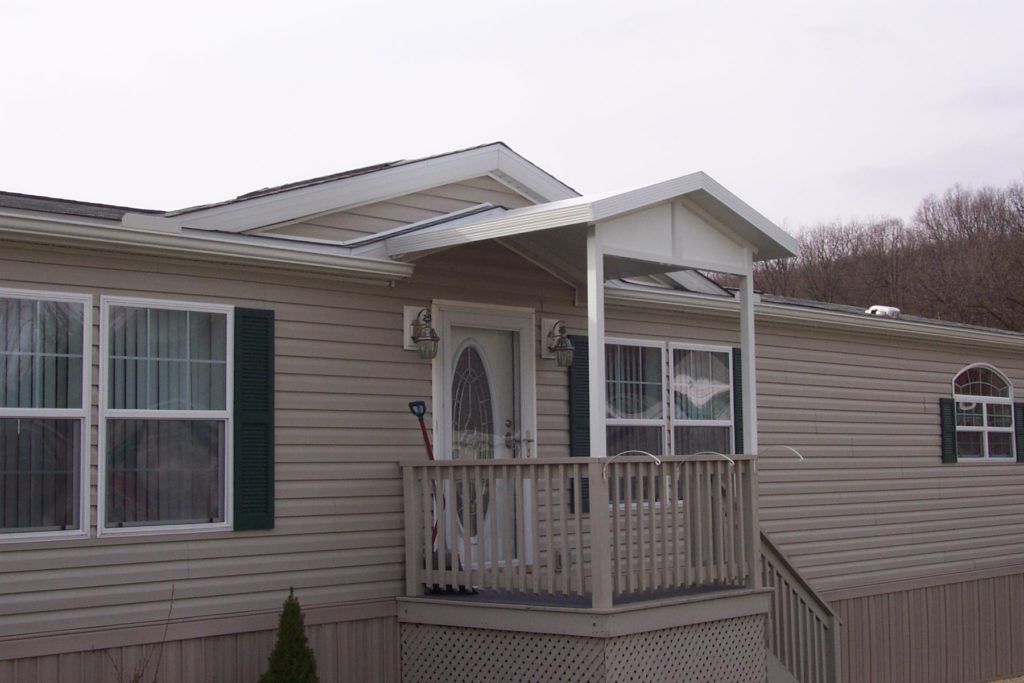 W pan single skin patio cover roof system on a residential home